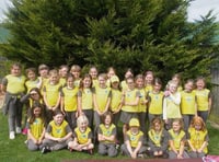 Crediton Brownies help their Brown Owl celebrate her 30 years as a leader