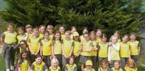 Crediton Brownies help their Brown Owl celebrate her 30 years as a leader