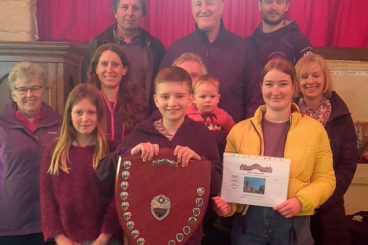 Chagford’s winning team, centre is the Tower Captain Jon Bint, his daughter Holly (in yellow) and 13 years-old Ewan Kaczanow.  Photo: Teresa Pearce
