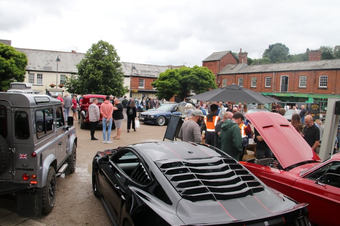 A busy town square at a previous Crediton Cars and Coffee.