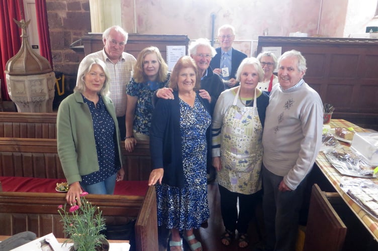 Organiser and helpers Church Wardens David Pennington and Elizabeth Jones, church treasurer and organiser Val Pennington, the Rev Robert Gordon, Stephen Hodder, Ellie Johnson, Karen Flawn and Margaret Widger.  SR 1974
