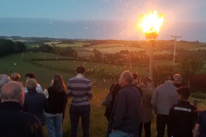 The beacon being lit at Coldridge and well alight.
