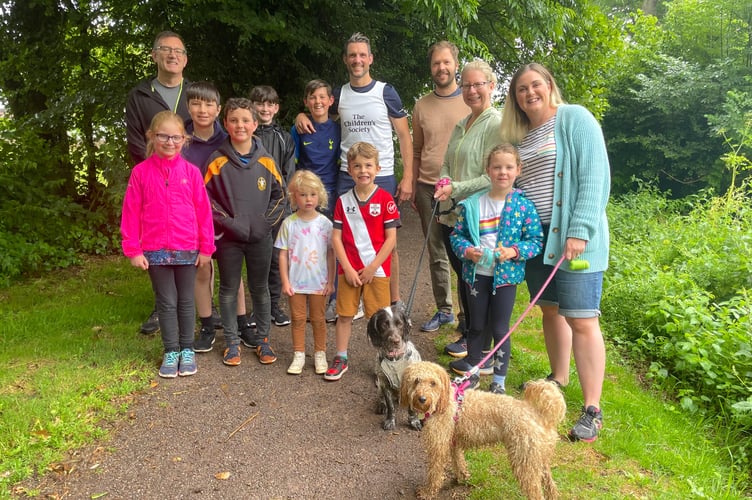 Ryan, centre, and some of his family and friends who took part in the 500th mile run.  AQ 0753
