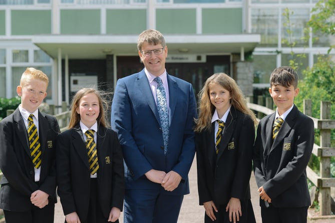 Rupert Poole pictured with students at Queen Elizabeth’s School in 2019.  Photo: QE School
