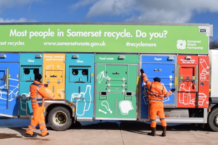 A recycling crew and their truck.