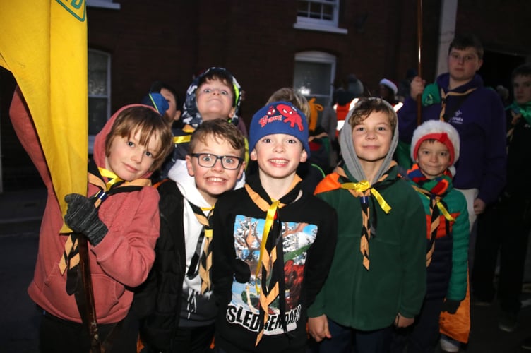 Some of the First Crediton Scouts during last year’s parade.  AQ 4590
