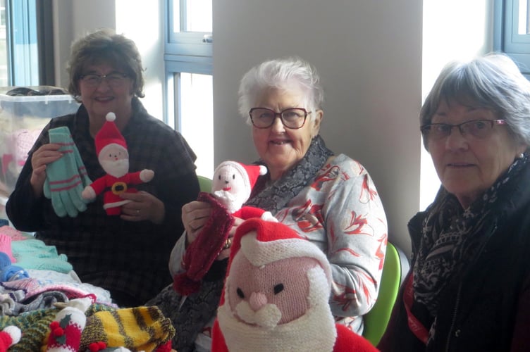 Sheila Job, chairman of the League of Friends, centre, with committee member Hazel Evely, left, and Chris Harris, right. SR 3033 
