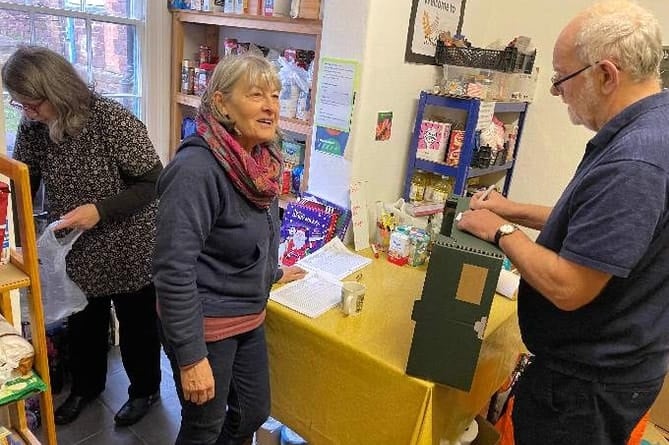 Busy volunteers at Crediton Foodbank.
