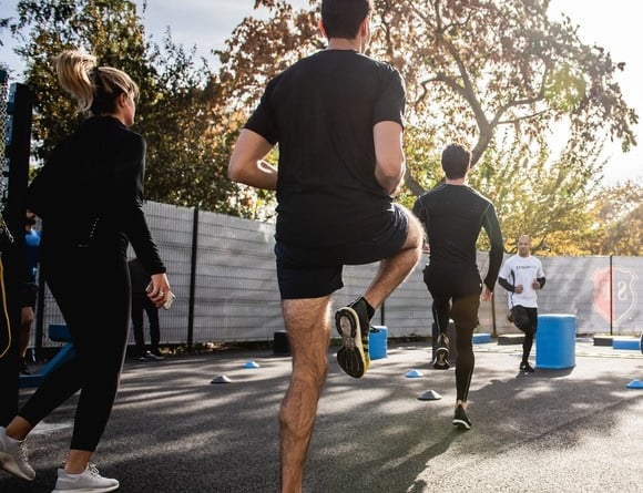 Joggers exercising.
