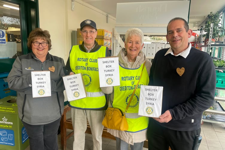 Rotary Club of Crediton Boniface members David Pitts, second left, and Crediton Club President Liz Ledsham, third left, with Hazel Evely, Crediton Morrisons community champion, left, and Paul Callow, Crediton Morrisons store manager, collecting in aid of the earthquake appeal.  AQ 3157
