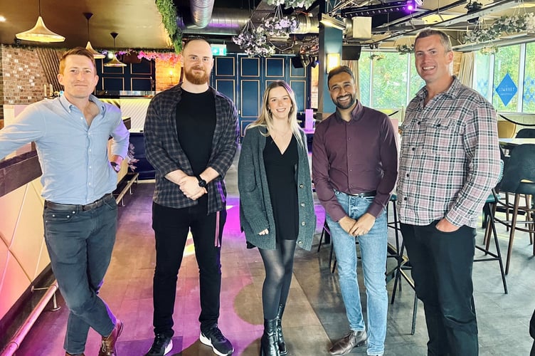 Raj Panchal, second from right, with the 'Funny Business' team and Emily Hayes the manager of The Terrace, centre.