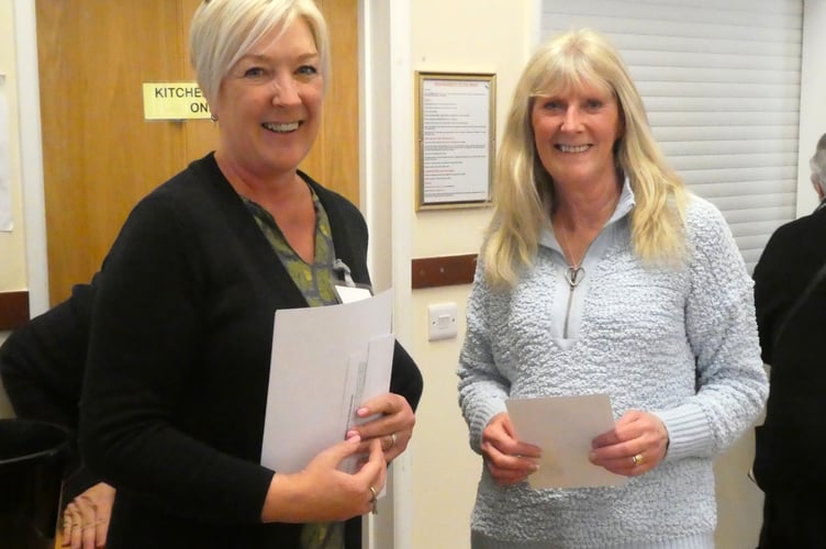 Jeannine Rundle, Show Secretary presents the Novice Flower Arranger Award to Mary Walker.