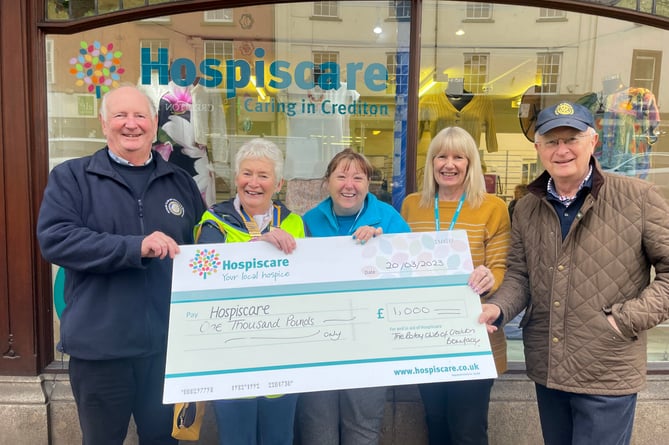 Presenting the cheque for £1,000, from left, Rotarians Paul Radnor and Liz Ledsham (president) and right, Barry Shears, with, centre, Sharon Collins and centre right, Shirley Buckingham.  AQ 4953