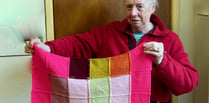 Joan has been knitting blankets for Battersea Dogs and Cats Home