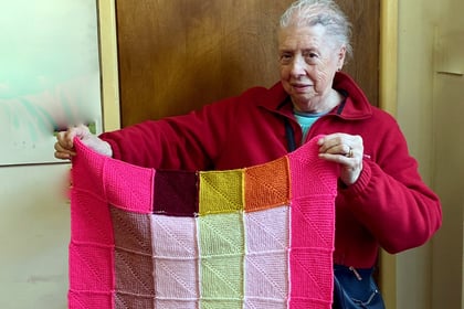 Joan has been knitting blankets for Battersea Dogs and Cats Home