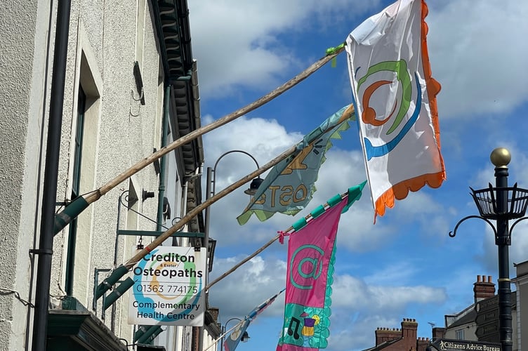 Flags in Crediton High Street by Alan Quick