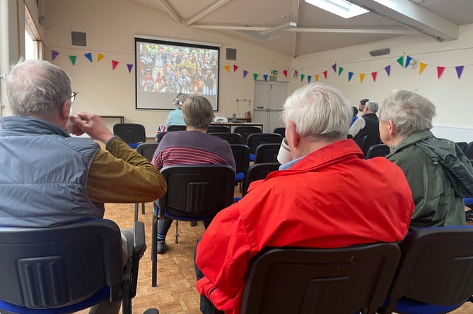 Watching the Coronation in the Boniface Centre.  AQ 7614