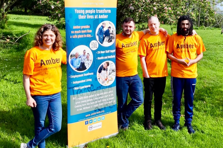 From left: Becky Fry, Fundraising Manager, Amber Foundation Devon, along with three young people from Amber, Kian, Byron and Shakeil.