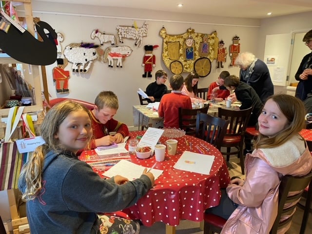 Wording and photographs from the hot chocolate and cake evening held at the ARK, where some Lapford Youth Club members enjoyed being with their Coronation artwork.