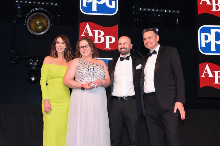 Fix Auto Mid Devon 2023 BBA award winners: Directors Erika Woolacott and Dom Lamb are recognised by the vehicle repair industry for Fix Auto Mid Devon’s eco-credentials and collect their latest award from TV celebrity Alex Jones and Paul Llewellyn of Ageas. 