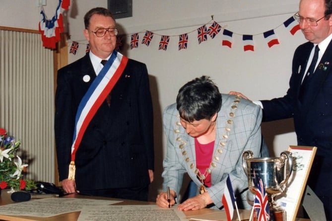 In the Boniface Centre, Chairman of the Council, Mrs Francine Richer signed on behalf of the Council, Peter Brewer signed as Chairman of the Twinning Association and Monsieur André Bazin, 1st Deputy Mayor and President of the Avranches Twinning Commission, signed on behalf of Avranches.