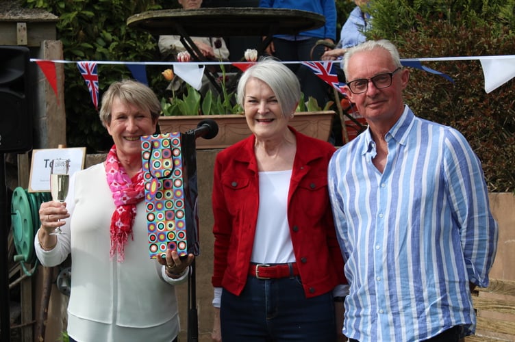 Village Hall Committee chairman, Kate Hudson (centre) with Sue and John Painter.  SR 7676