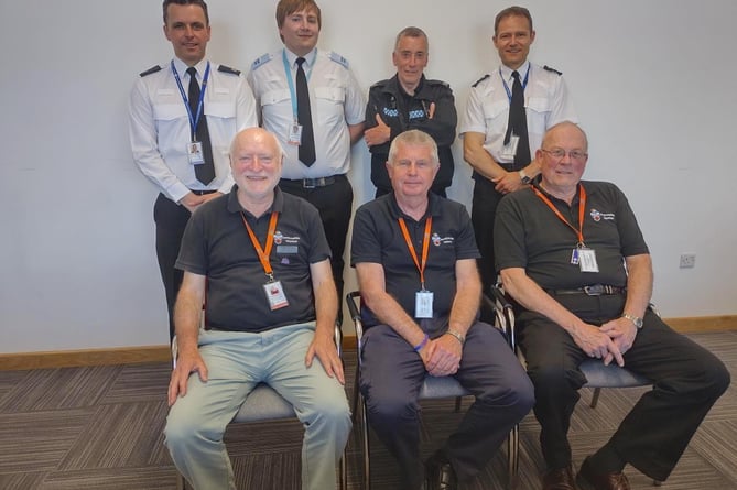 Some of the police volunteers with Supt Antony Hart (standing left) and Ch Insp John Shuttleworth, standing on the right.