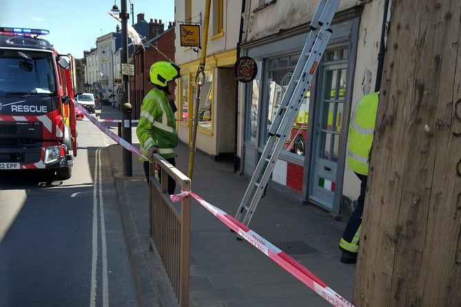 Danes Castle Exeter Blue Watch crew which came to Crediton to inspect and make safe the potentially dangerous structure in Crediton High Street at the weekend.