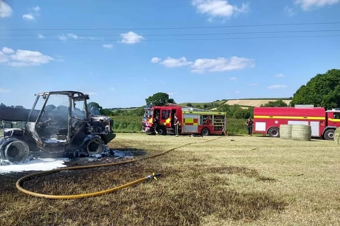 Fire crews at the scene of the telehandler fire near Yeoford.