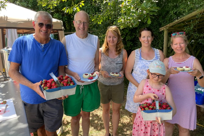 Helpers who served strawberry cream teas at last year’s Friends of Sandford School Strawberry Fair.  AQ 1391