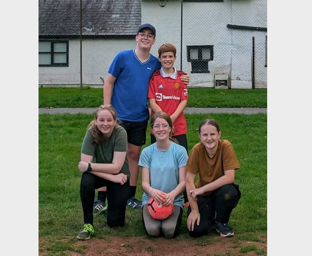 QE students organising a young person's charity football tournament 
