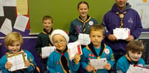 1st Crediton Scout Post Service raised £220 in stamp sales
