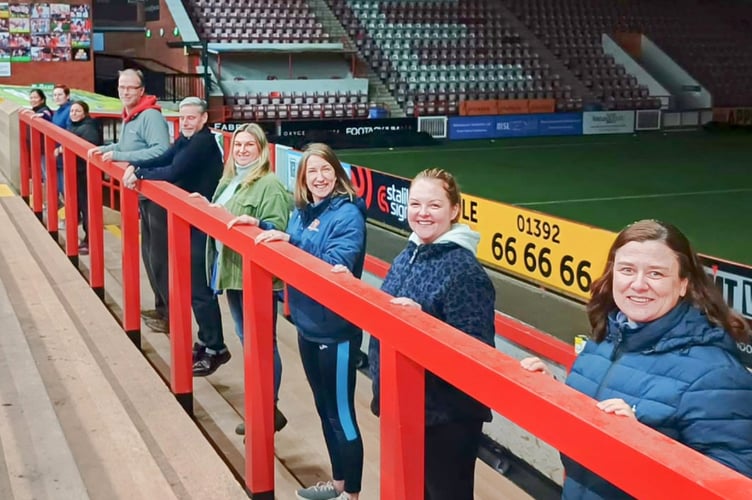 The group taking part in an activity session on the Big Bank at St James Park.