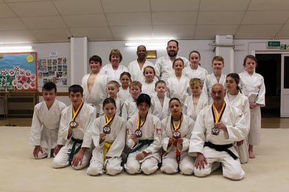 A medal each for five Tedburn St Mary Judo Club students

