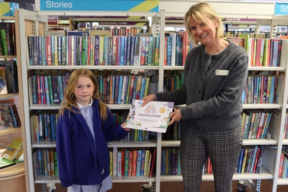 Local girl reads 50 books in single year in library challenge