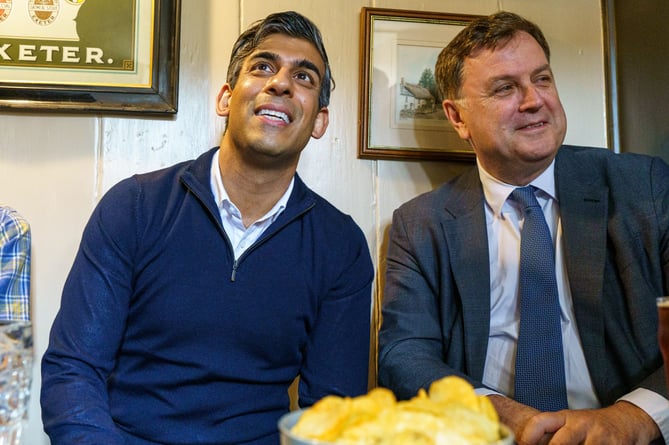 Prime Minister Rishi Sunak popped into the Drewe Arms Community Pub at Drewsteignton for a pint of pop.
The PM, a teetotaller, was visiting the pub  which has been taken into community ownership, with  Work and Pensions Secretary Mel Stride as he hit the election trail in Devon. 