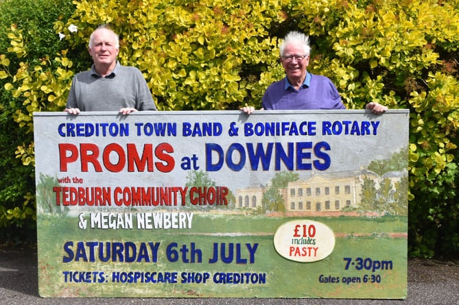 The Proms at Downes noticeboard was painted by Mike Palmer, right, and erected by John Cope, left