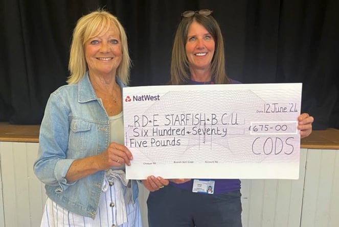 Carol Stoyle from CODS presenting the cheque to Debbie Allen of the RD and E Charities.
