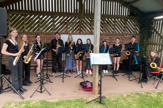 Crediton Youth Orchestra Saxophone Ensemble provided musical entertainment.  AQ 5549
