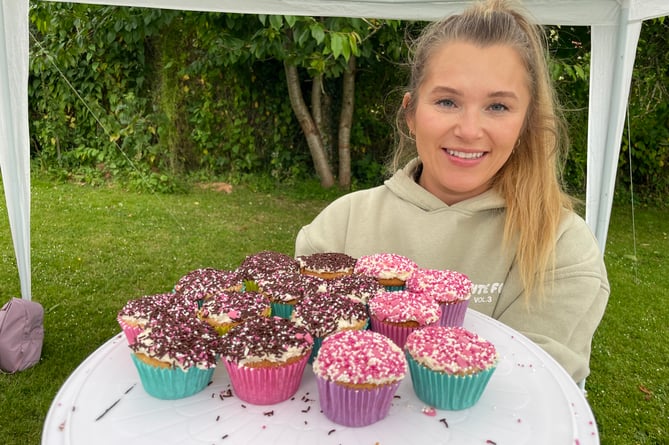 There were lots of cakes for sale on the cake stall.  AQ 5543
