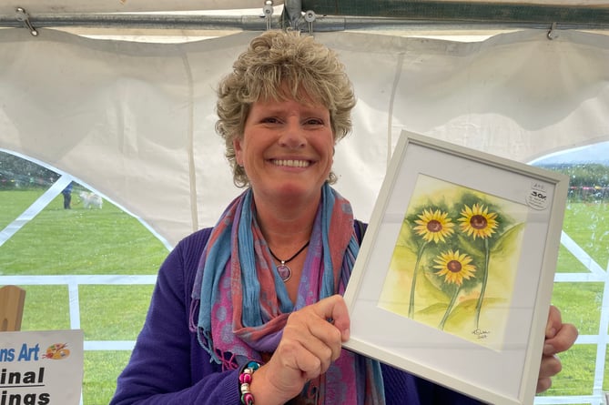 Karen Gutans of Bow was selling some of her art at the Fair, some also in aid of the Brain Tumour Charity.  AQ 5184 
