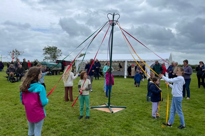 Children from Spreyton Primary School demonstrated Maypole dancing, performing two different dances.  AQ 5155
