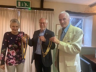 At the handover of chains of office, from left, Rotarians Jane Brimacombe, Fred Oliver and right, Garry Adams.
