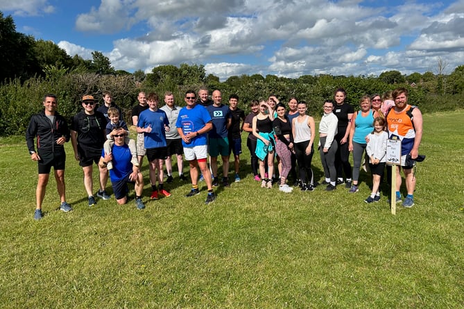 James Coleman, centre left, and those who took part in the run. 
