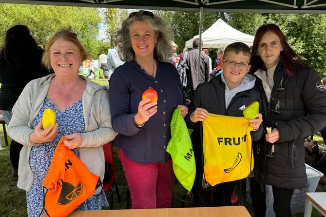 The Human Fruit Machine was a popular stall.  AQ 6966