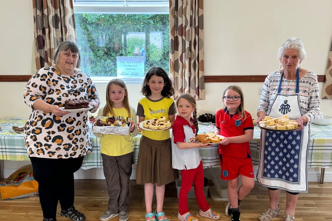 The sale of delicious refreshments at the ceremony provided by Cheriton Fitzpaine Rainbows and Brownies raised £88.  AQ 7026
