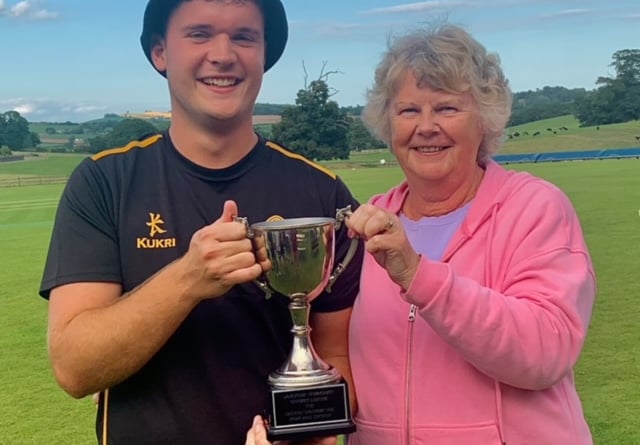 Sue Sparham presenting the Barrie Sparham OBE Memorial Trophy to the Pigs captain Josh Davey.
