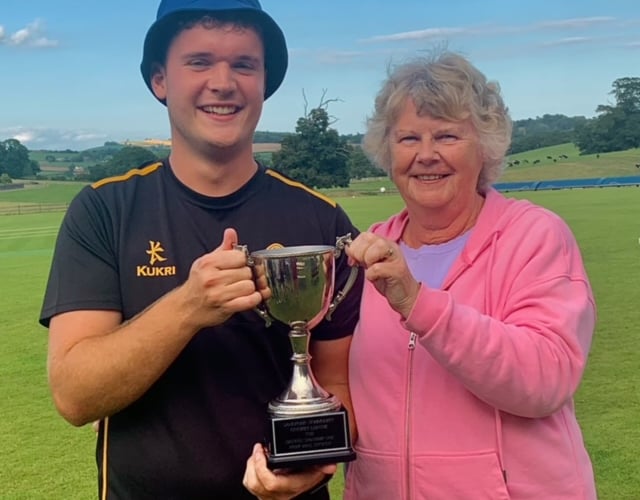 Sue Sparham presenting the Barrie Sparham OBE Memorial Trophy to the Pigs captain Josh Davey.
