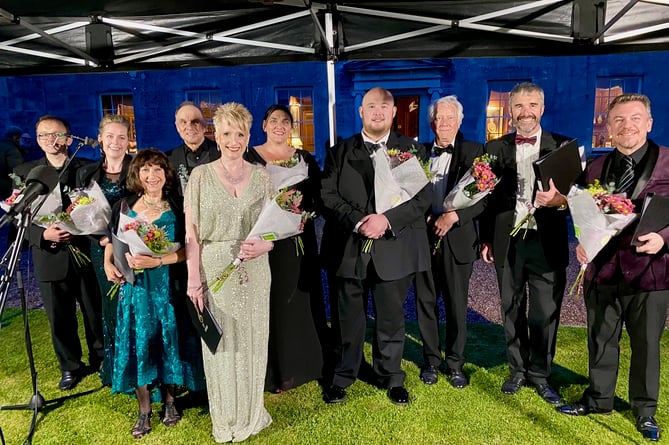 Staircase Opera and the floral gifts they received.  
