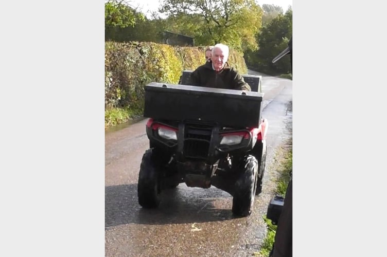 Seward Folland on his quad bike.
